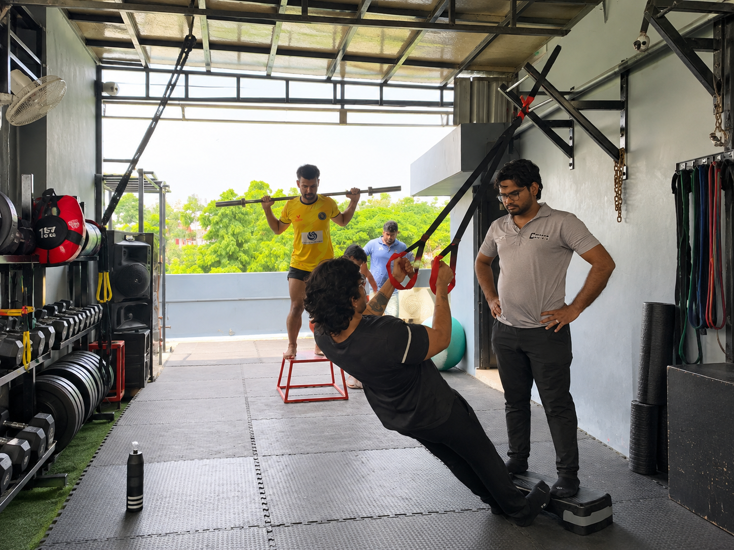 COMM physiotherapist coaching a patient on the floor during rehabilitation